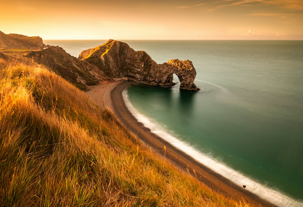 The coast road and a cove, within cycling distance