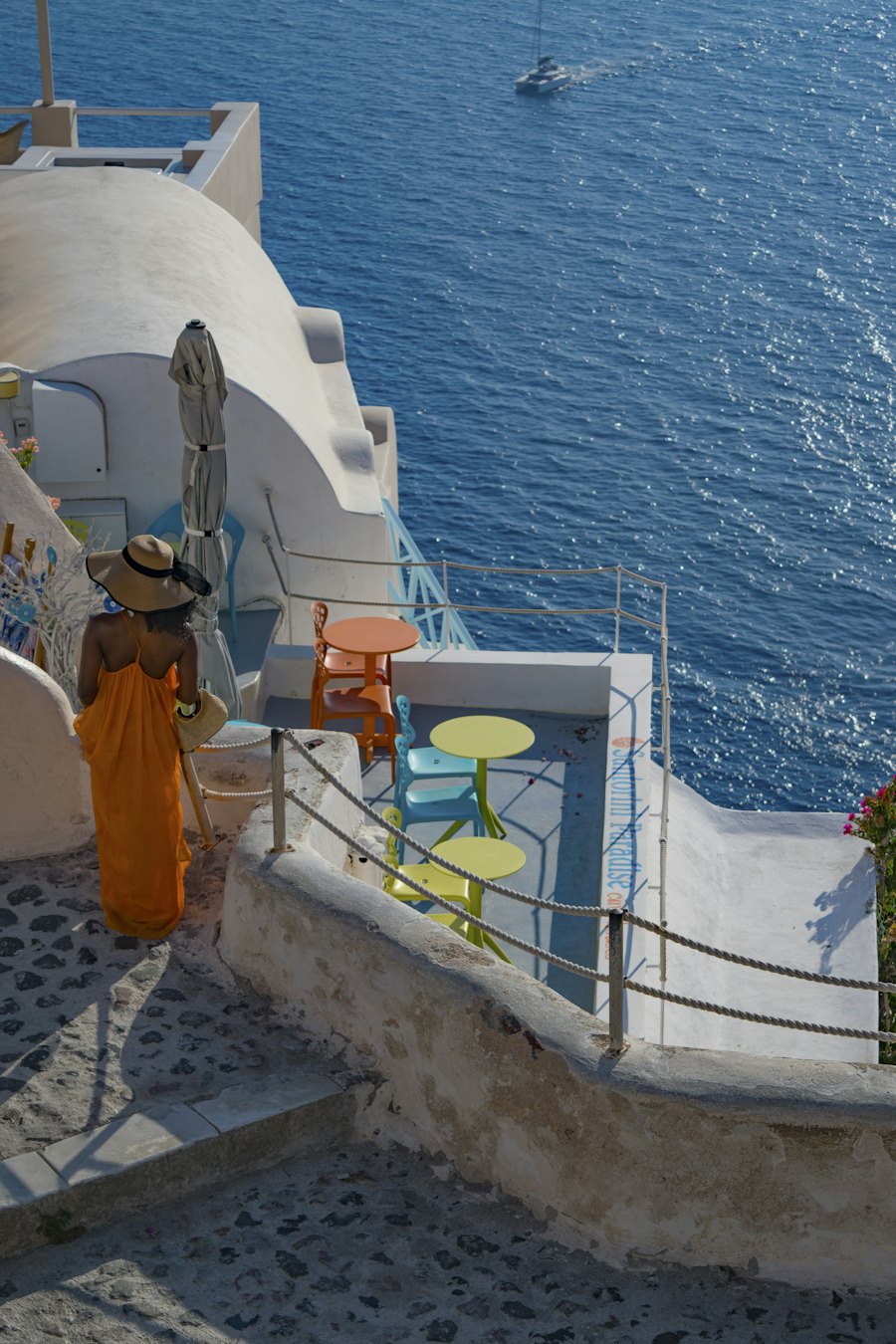 Deep blue sea seen from a whitewashed terrace