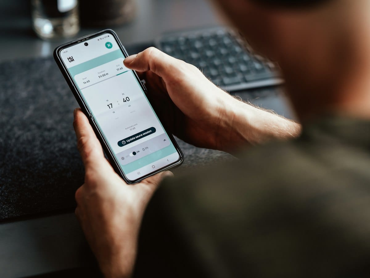 Someone using a mobile banking app on their phone